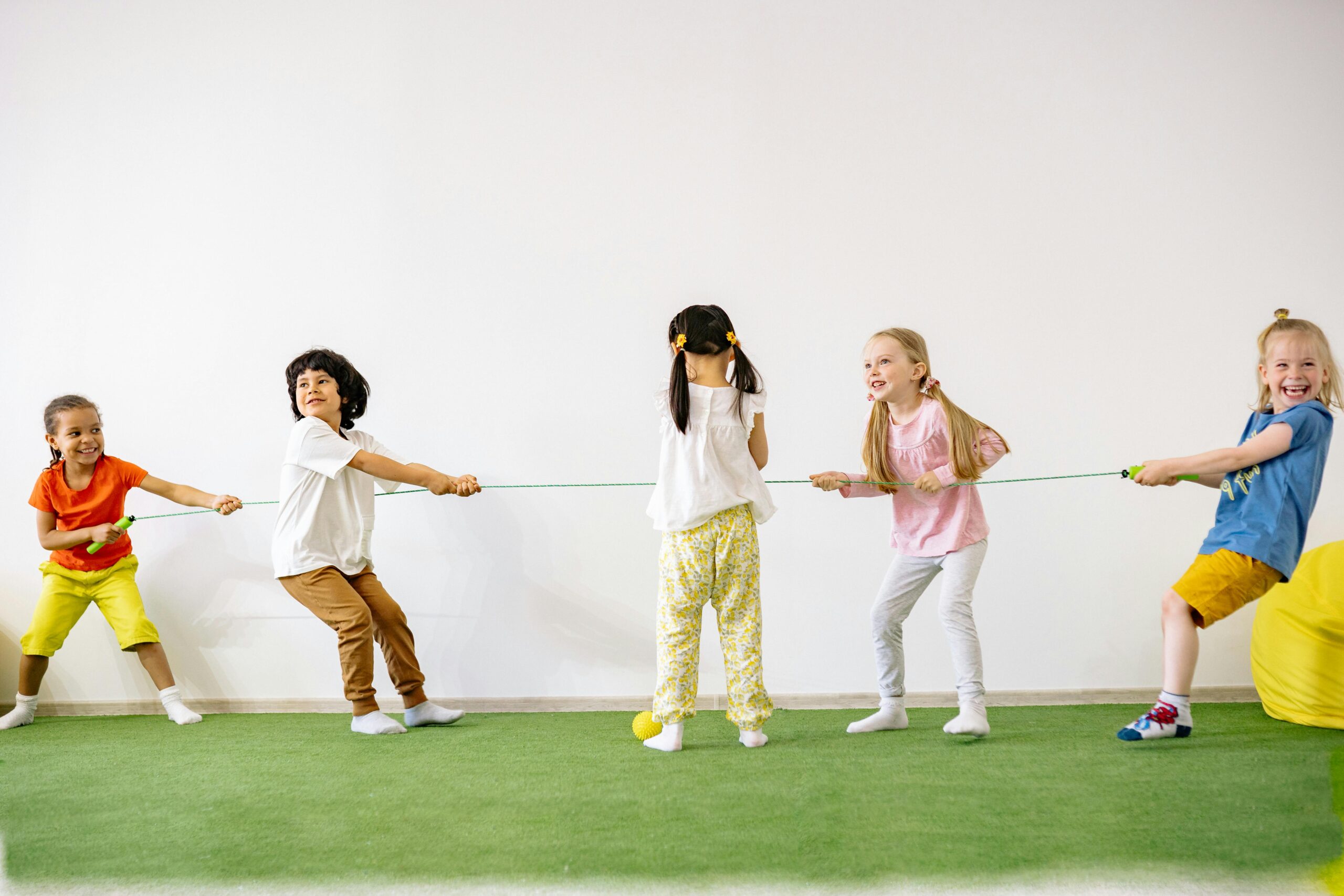 Children playing tug of war.